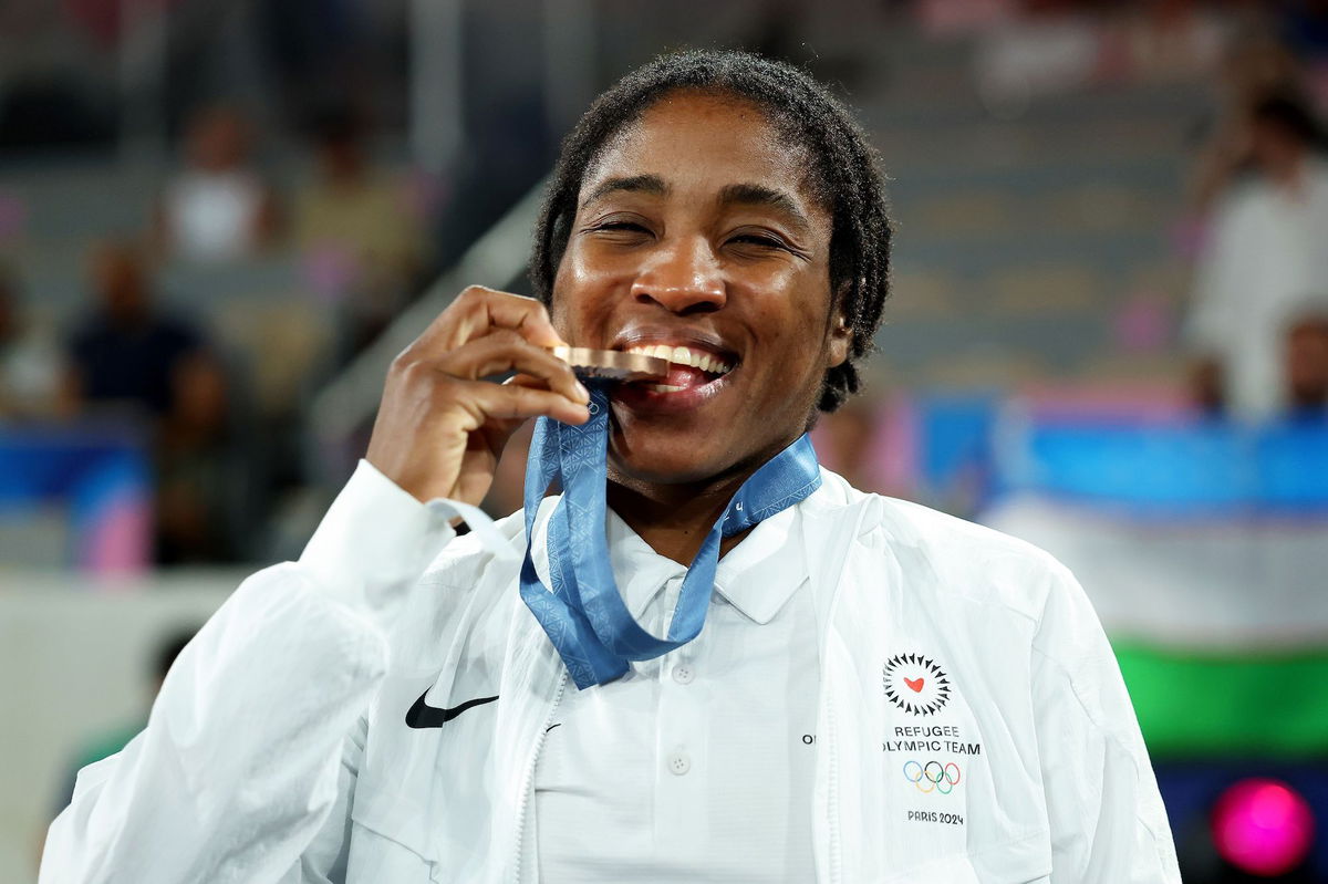 <i>Richard Pelham/Getty Images via CNN Newsource</i><br/>Boxer Cindy Ngamba celebrates her bronze medal at the Paris Olympics.