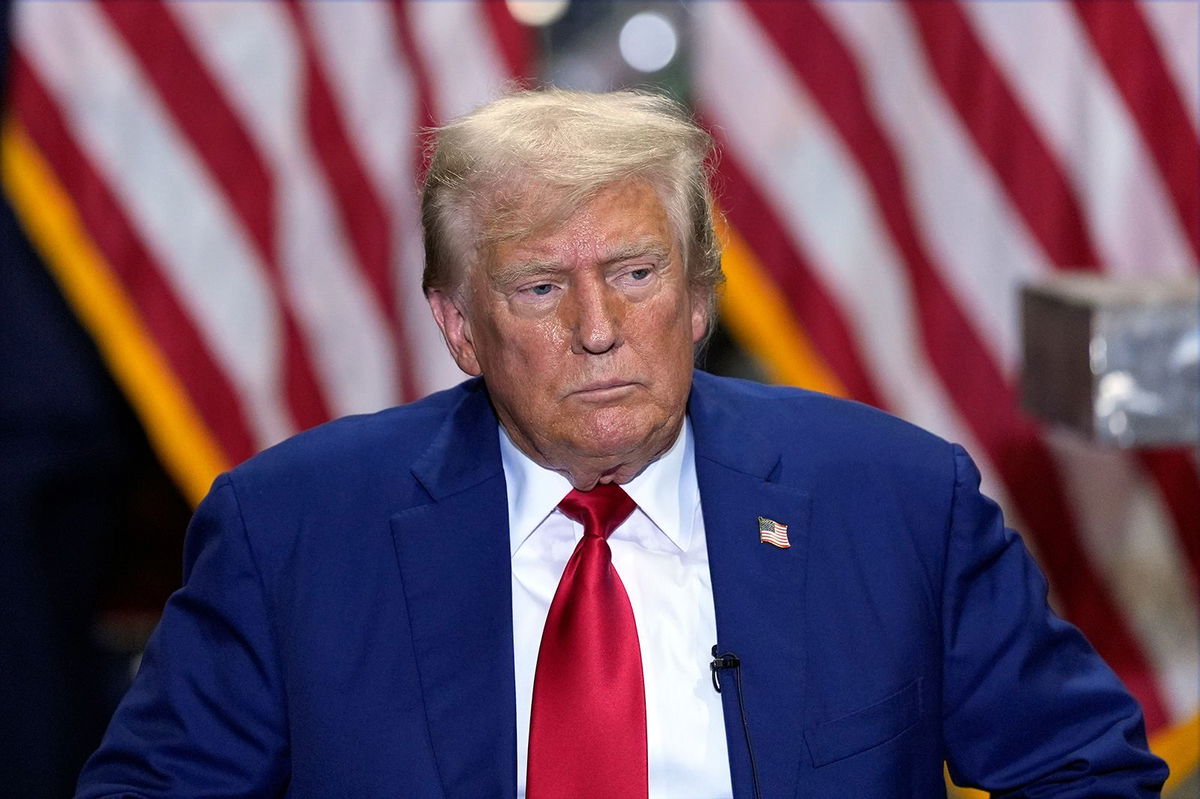 <i>Julia Nikhinson/AP via CNN Newsource</i><br/>Former President Donald Trump listens at a business roundtable discussion in York