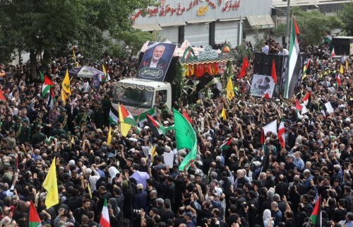 Iranians attend the funeral procession of Hamas chief