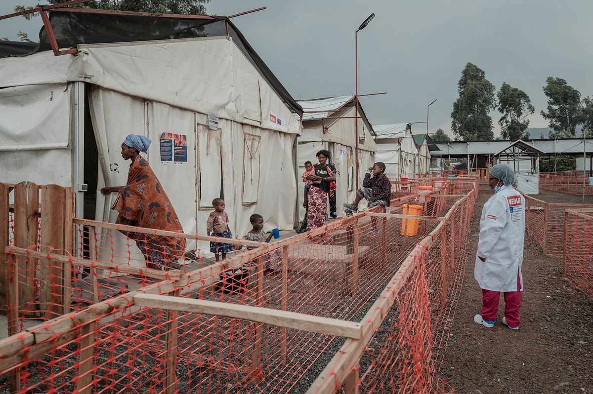 <i>Guerchom Ndebo/AFP/Getty Images via CNN Newsource</i><br/>Patients stand at an mpox treatment centre at Nyiragongo General Referral Hospital