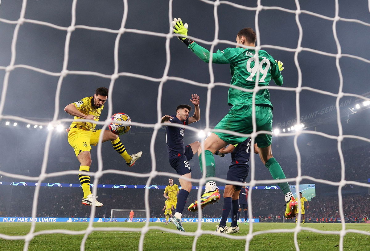 <i>Richard Heathcote/Getty Images via CNN Newsource</i><br/>Mats Hummels scores for Borussia Dortmund against Paris Saint-Germain during the 2023/24 Champions League semifinal.