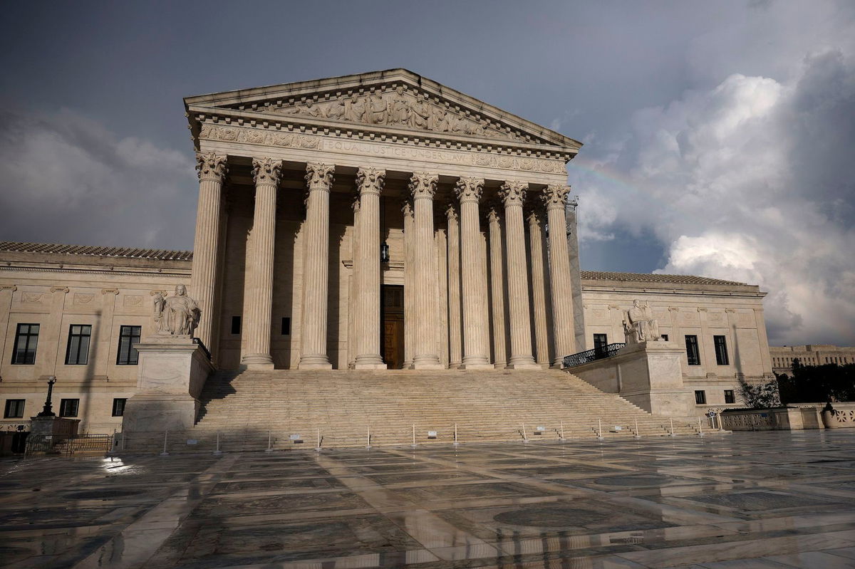 <i>Kevin Dietsch/Getty Images/File via CNN Newsource</i><br/>Passing storm clouds are seen over the U.S. Supreme Court on July 30