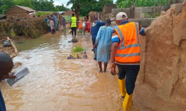 Nigerian emergency management agency officials visit a flood-ravaged area in northern Jigawa State.