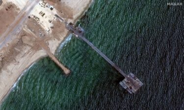 A Maxar Technologies satellite image on June 12 shows the floating pier off the Gaza shoreline. President Joe Biden authorized a plan to deliver aid to Gaza through the pier as officials warned of weather and security challenges.