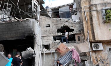 Palestinians inspect the damage after Israeli soldiers raided the Nur Shams Refugee Camp in Tulkarem