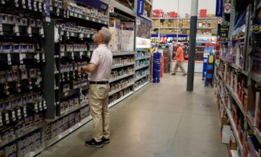 A customer shops in a Lowe's home improvement store on August 20