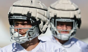 Tight ends Jesper Horsted #80 and Nick Bowers #82 of the Las Vegas Raiders wear Guardian Caps as they practice during training camp at the Las Vegas Raiders Headquarters/Intermountain Healthcare Performance Center on August 01