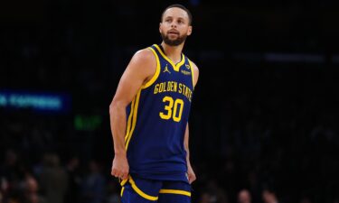 Steph Curry looks on during a Golden State Warriors game against the Los Angeles Lakers.