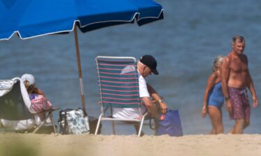 President Joe Biden and first lady Jill Biden lounge on the beach in Rehoboth Beach