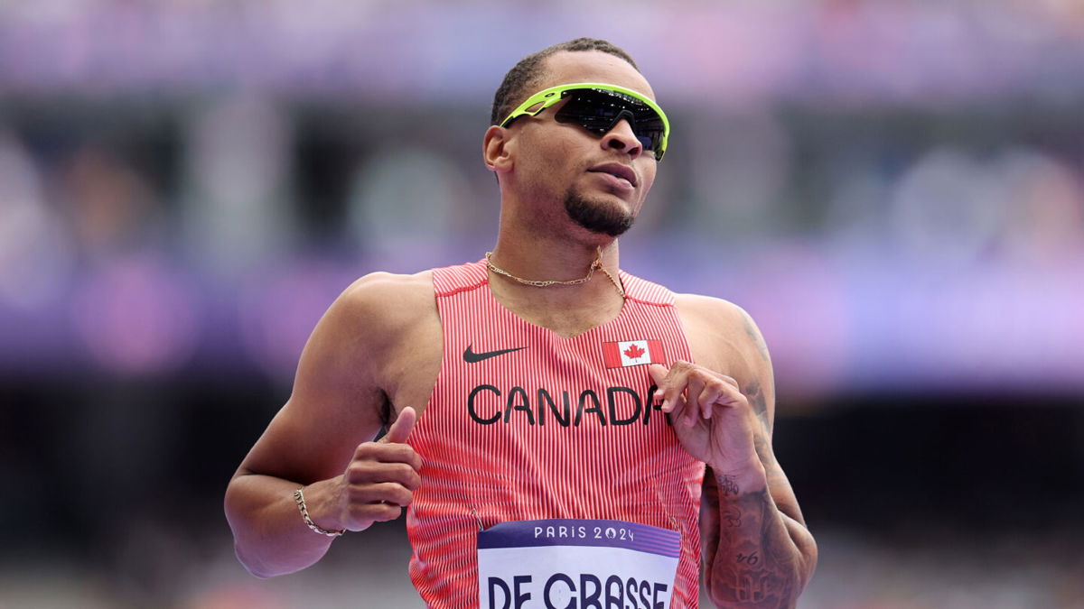 Andre de Grasse of Canada looks on during the first round of the men's 100m on day eight of the Paris Olympics at the Stade de France on August 03