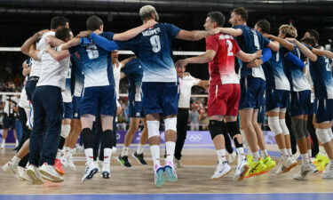 France's players celebrate after winning the men's volleyball gold medal match between France and Poland at the South Paris Arena