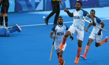 Harmanpreet Singh celebrates scoring his team's first goal in the men's semifinal field hockey match between Germany and India during the Paris Olympics at the Yves-du-Manoir Stadium in Colombes on August 6