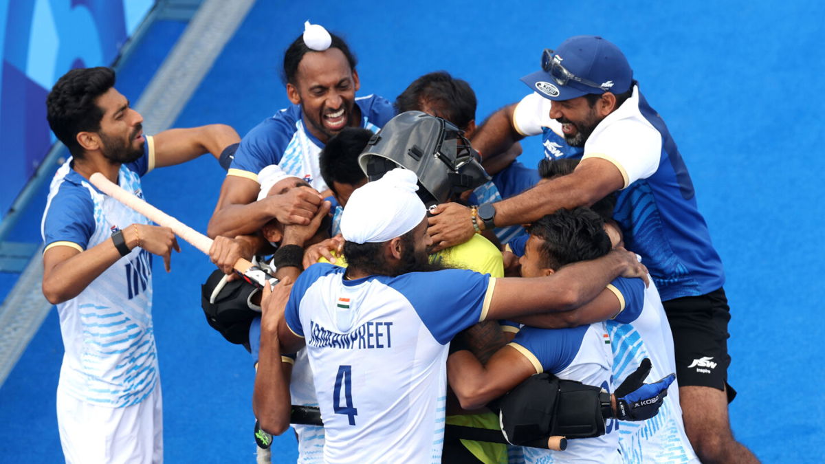 India celebrates a victory in the men's quarterfinal match between India and Great Britain on day nine of the Paris Olympics at Stade Yves Du Manoir on August 04