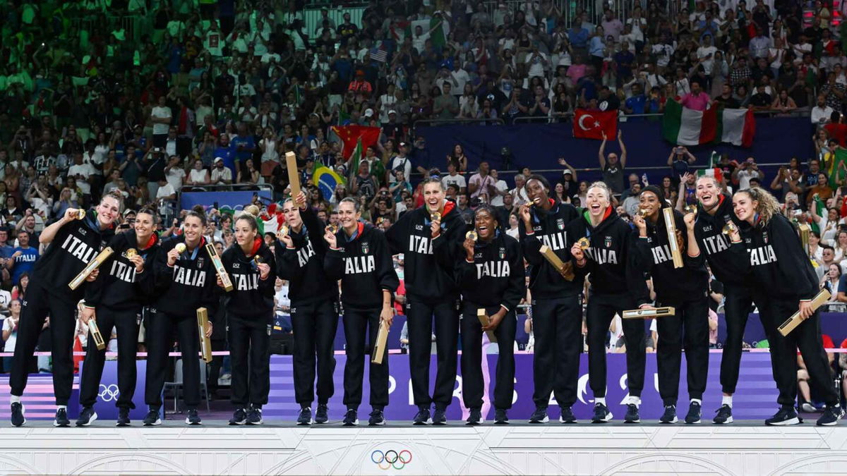 Team Italy celebrates winning gold at the end of women's gold medal volleyball match on day 16 of the Paris Olympics at Paris Arena on August 11