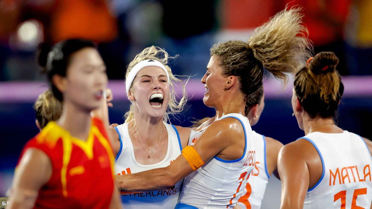 Yibbi Jansen of the Netherlands celebrates her game-tying goal during the gold medal match against China at the Stade Olympique Yves du Manoir on August 9