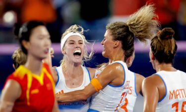 Yibbi Jansen of the Netherlands celebrates her game-tying goal during the gold medal match against China at the Stade Olympique Yves du Manoir on August 9