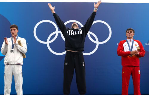 Gold medalist Giovanni de Gennaro of Team Italy celebrates on the podium during the Canoe Slalom Men's Kayak Single medal ceremony after the the Canoe Slalom Men's Kayak Single Final.