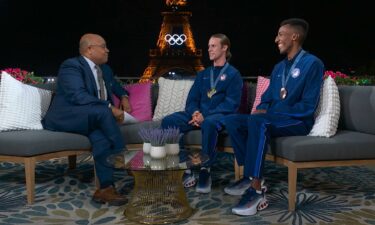 Cole Hocker and Yared Nuguse with Mike Tirico at 2024 Paris Olympic Games