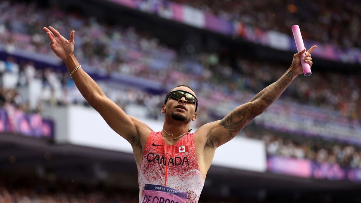 Andre De Grasse celebrates for Canada.