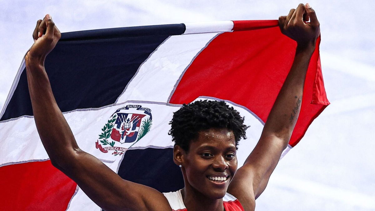 Marileidy Paulino celebrates with Dominican Republic  flag