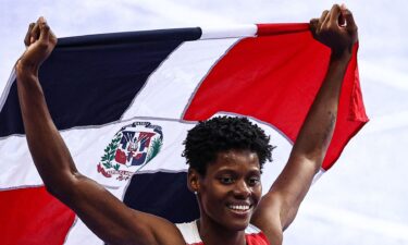 Marileidy Paulino celebrates with Dominican Republic  flag