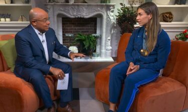 Valarie Allman with Mike Tirico at 2024 Paris Olympic Games