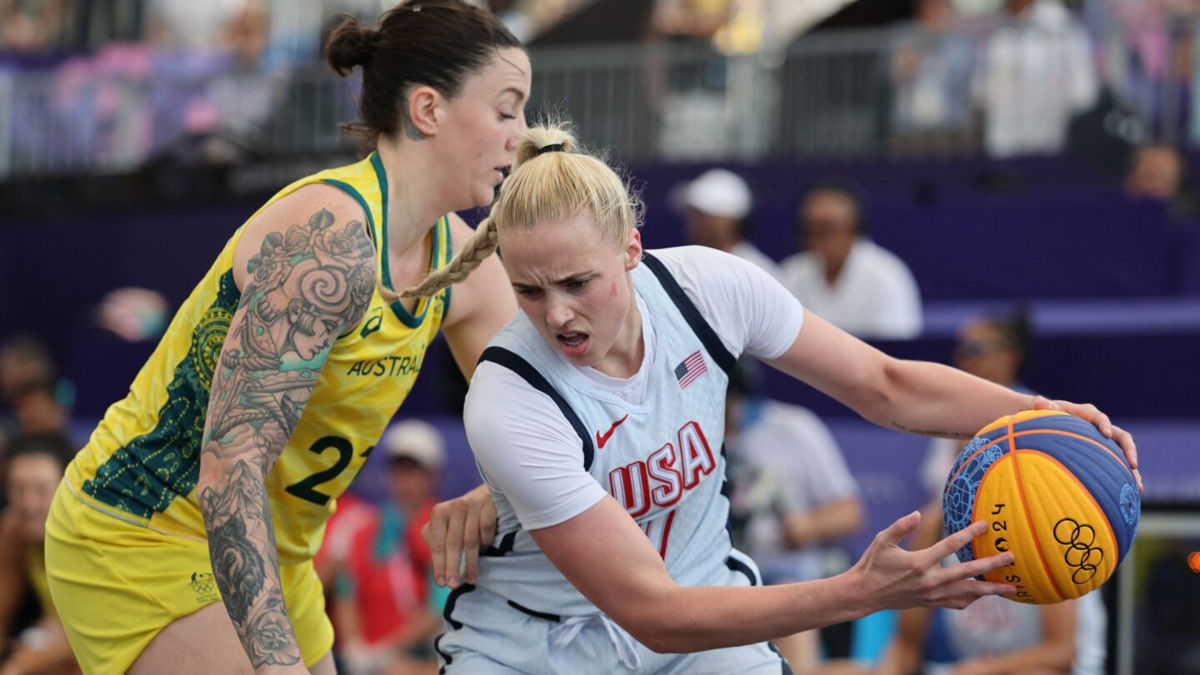 Hailey Van Lith holds the ball vs. Australia