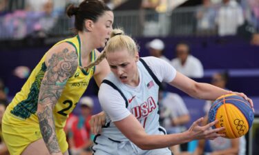 Hailey Van Lith holds the ball vs. Australia