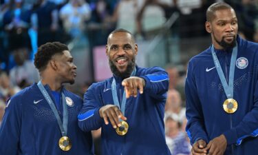 Team USA receives its gold medals after win over France