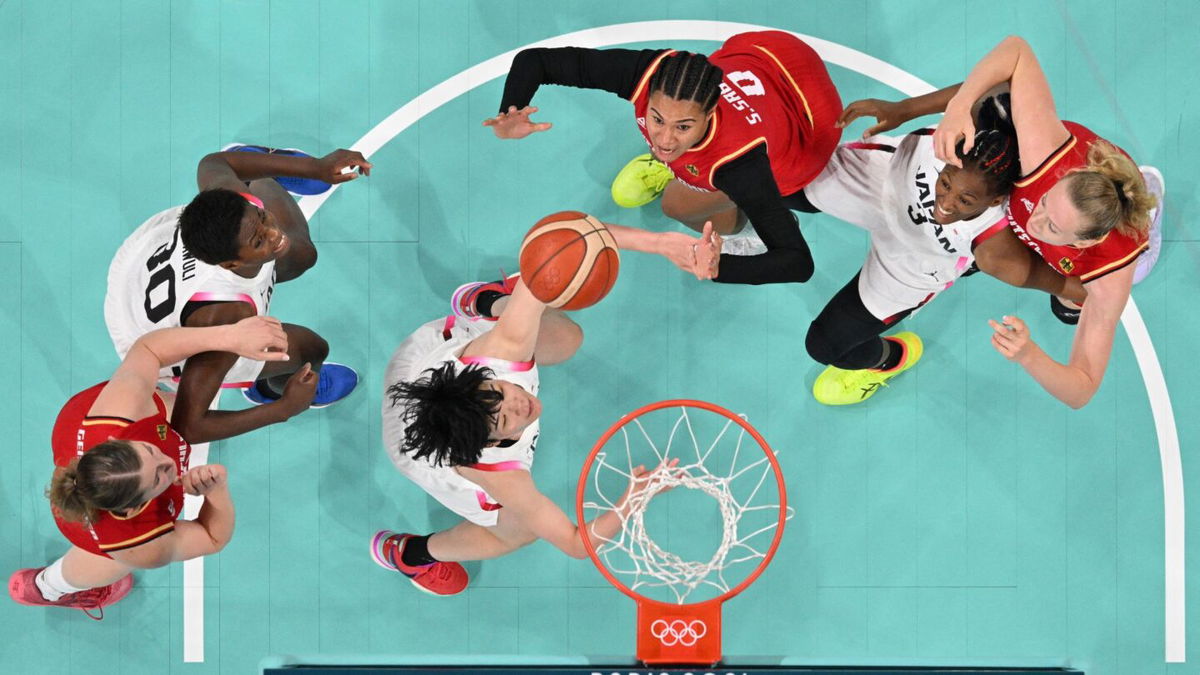 Satou Sabally jumps for a rebound vs. Japan