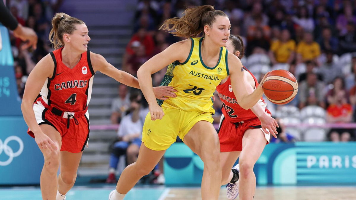 Sami Whitcomb dribbles vs. Canada