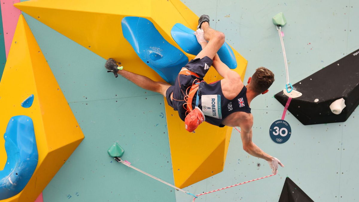 Toby Roberts climbs