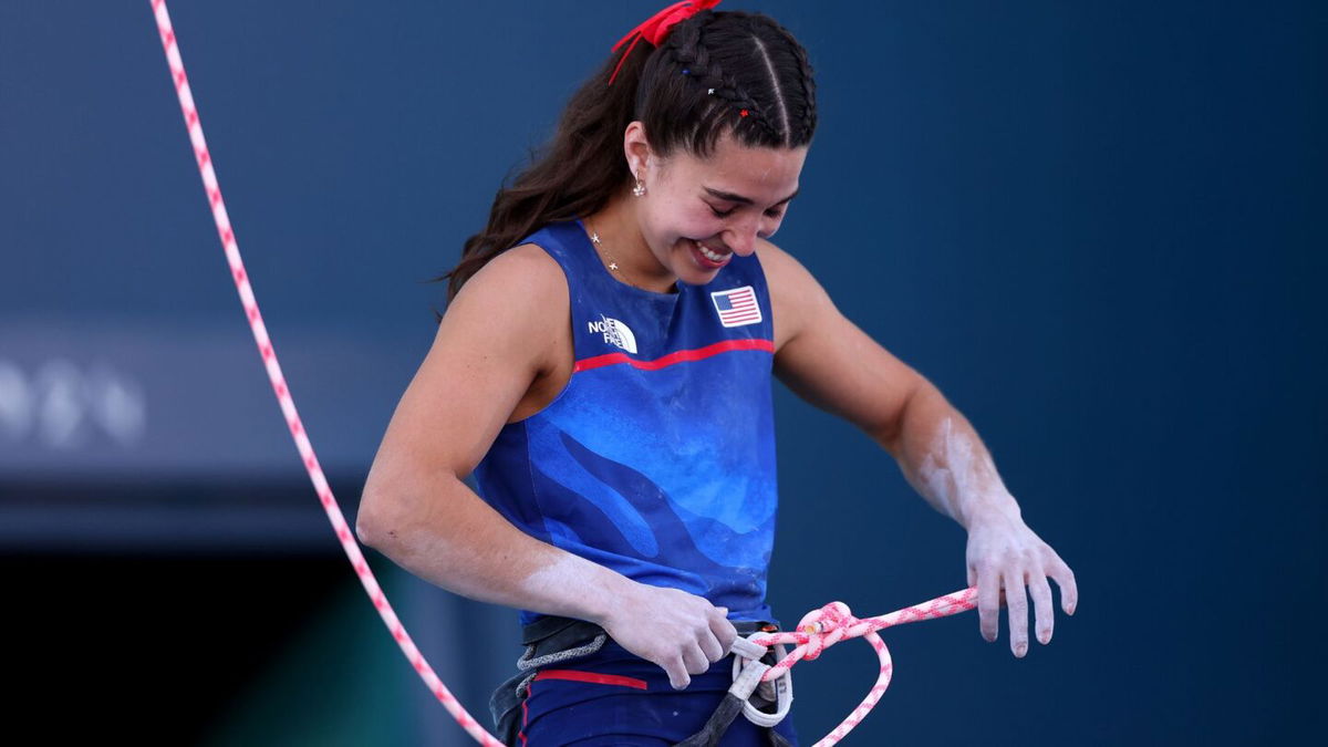 Brooke Raboutou unknotting her harness