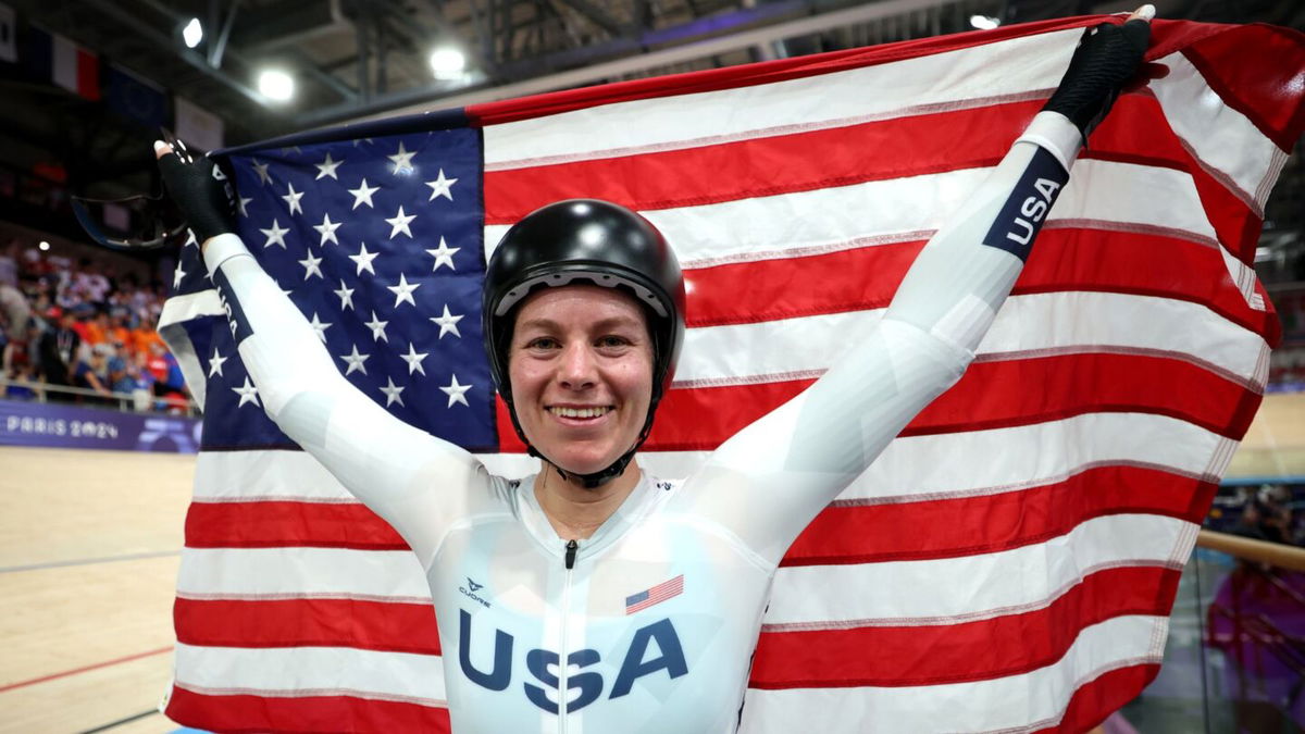 Valente celebrates winning gold in the omnium