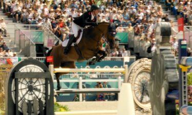 Ben Maher jumps an obstacle