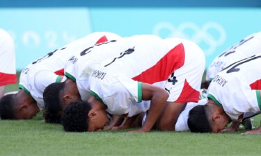 Morocco players celebrate after winning a match