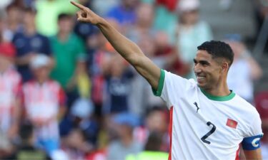 Achraf Hakimi celebrates after scoring a goal