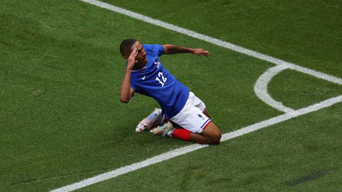 France player celebrates after scoring a goal