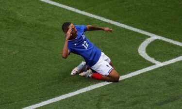 France player celebrates after scoring a goal