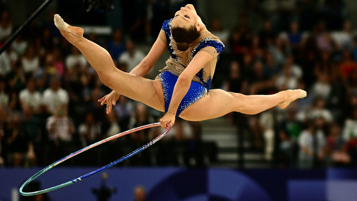 Evita Griskenas excels with hoop routine during qualifying KTVZ