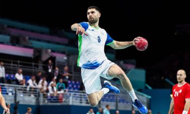 Slovenia handball player prepares to take a shot