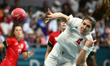 Hungary handball players shoots the ball.