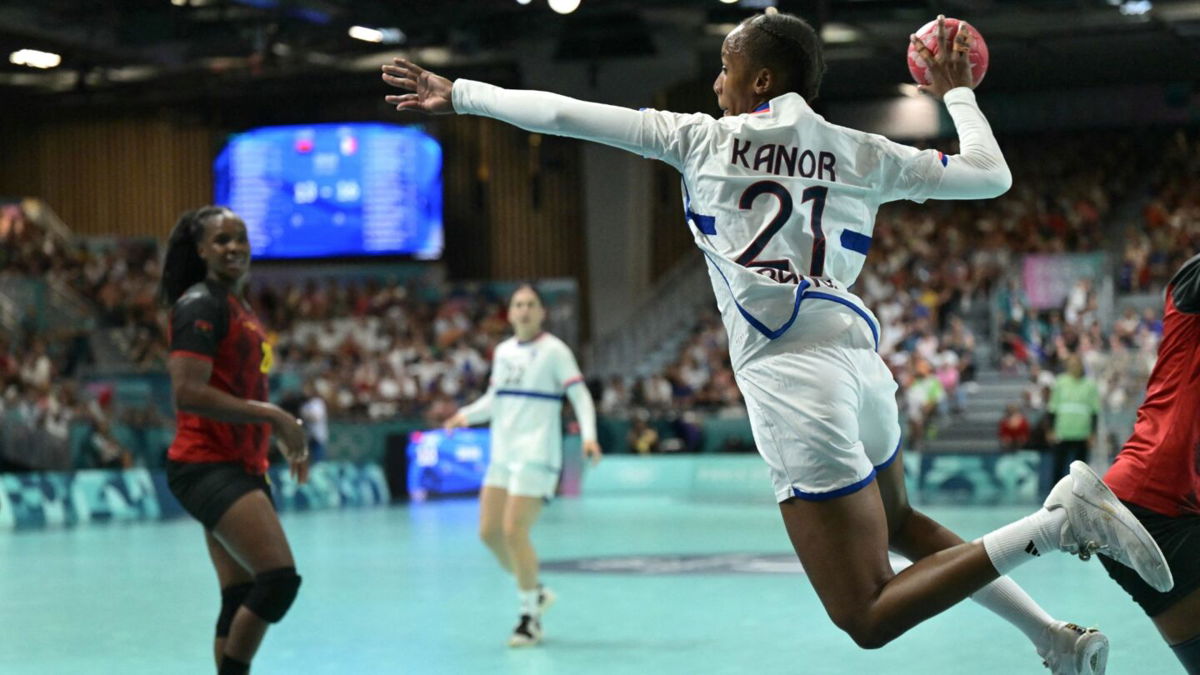 France handball athlete prepares to shoot the ball.