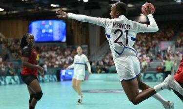 France handball athlete prepares to shoot the ball.