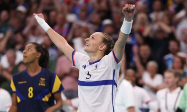 France player celebrates after winning a match