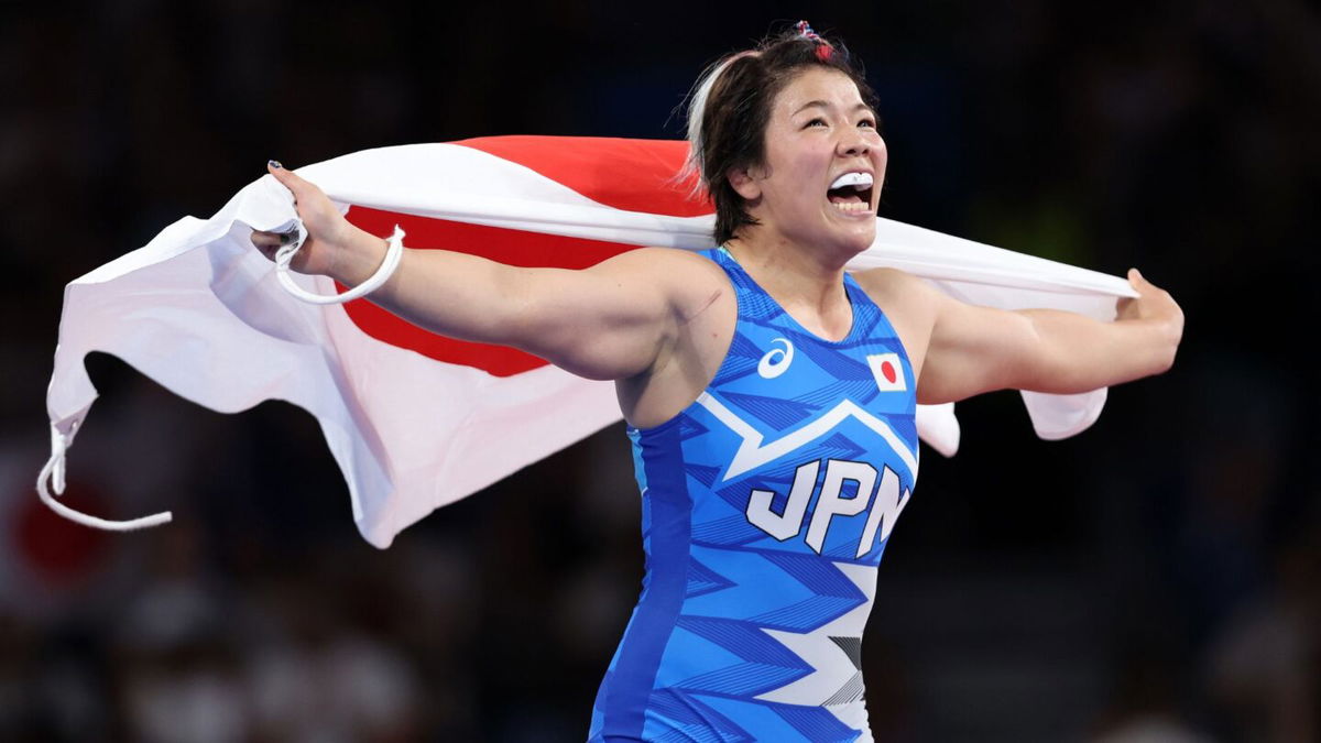 Yuka Kagami celebrates 76kg wrestling gold