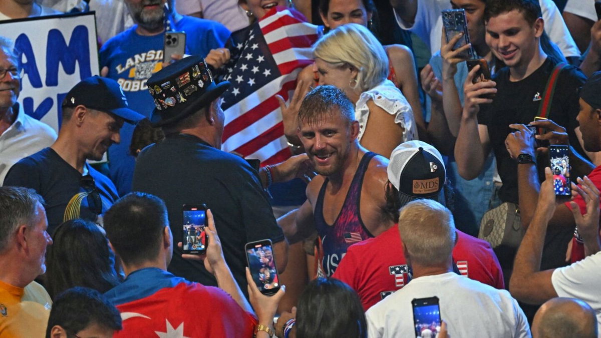 Kyle Dake celebrates