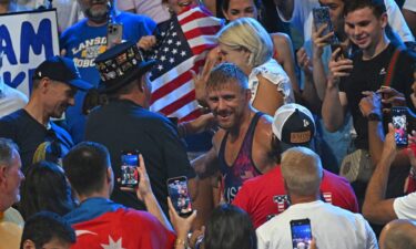 Kyle Dake celebrates