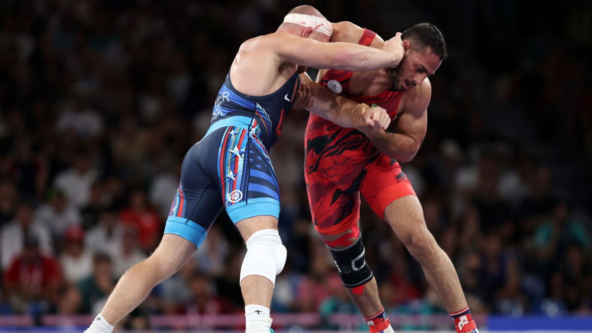 Iran's Azarpira wrestles USA's Kyle Snyder