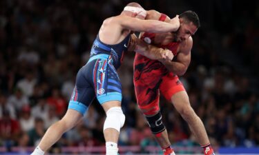 Iran's Azarpira wrestles USA's Kyle Snyder